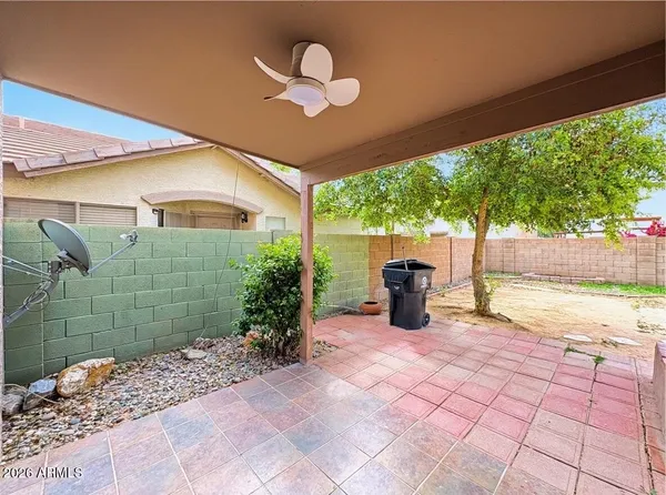 a view of a porch with seating space