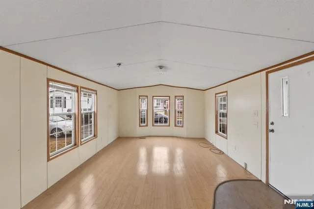 a view of livingroom with furniture wooden floor and window