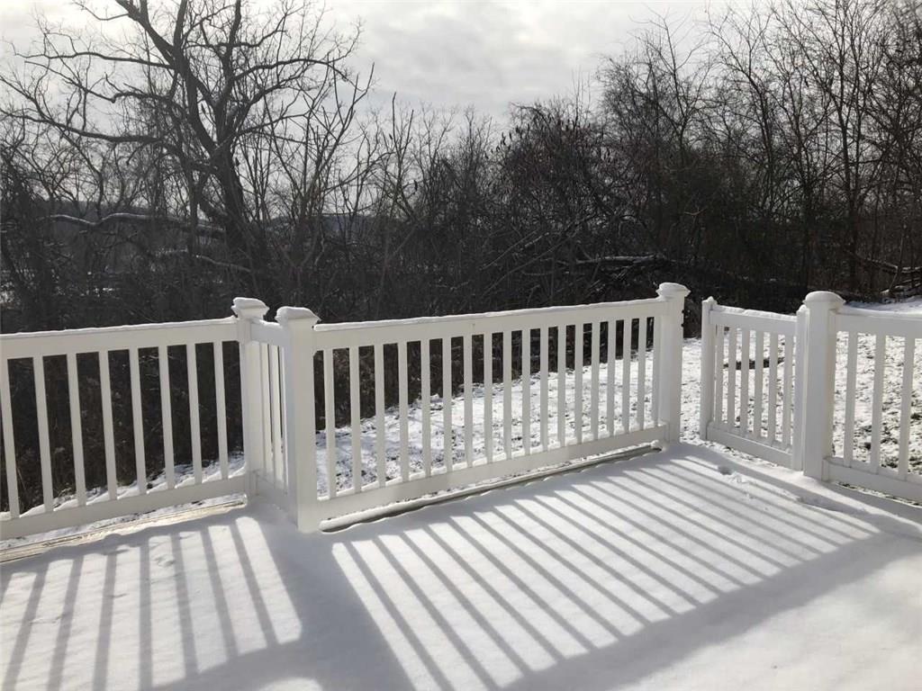 231 Maple Ridge Drive Canonsburg, PA 15317 - Photo 12 of 25 MAINTENANCE-FREE TREX DECK! Morning coffee and a wooded view! Dinner with a sunset view and beverages under the stars!