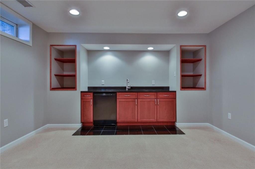 231 Maple Ridge Drive Canonsburg, PA 15317 - Photo 24 of 25 The gameroom features a wet bar with granite top...entertain in style!