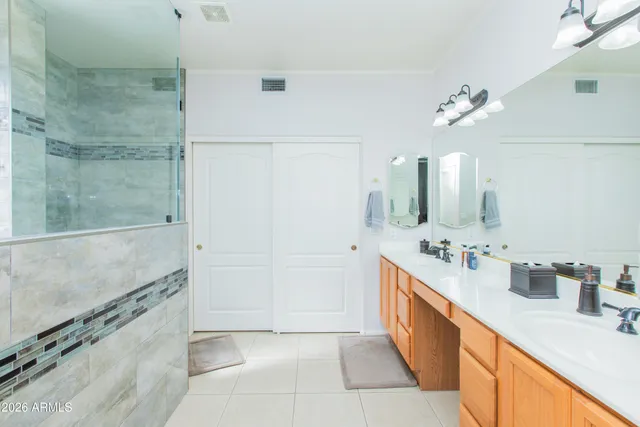 a bathroom with a bathtub and shower