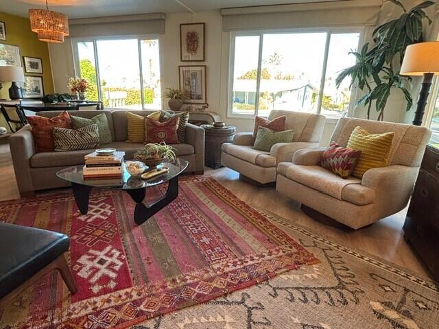 49305 Highway 74, Unit 109 Palm Desert, CA 92260 - Photo 18 of 52 a living room with furniture and a large window