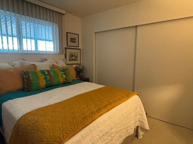 49305 Highway 74, Unit 109 Palm Desert, CA 92260 - Photo 20 of 52 a bedroom with a bed and window
