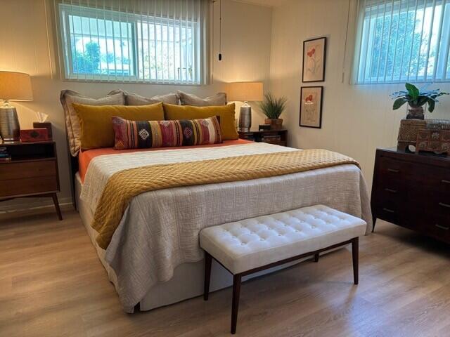 49305 Highway 74, Unit 109 Palm Desert, CA 92260 - Photo 23 of 52 a bedroom with a bed and window