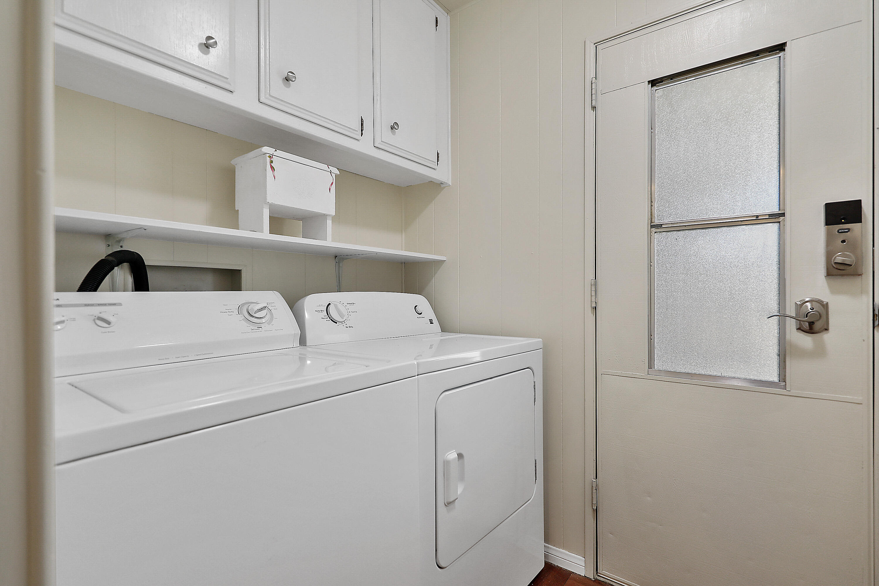 49305 Highway 74, Unit 109 Palm Desert, CA 92260 - Photo 28 of 52 a utility room with dryer and washer