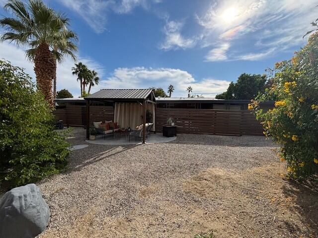 49305 Highway 74, Unit 109 Palm Desert, CA 92260 - Photo 35 of 52 a view of a terrace with a garden