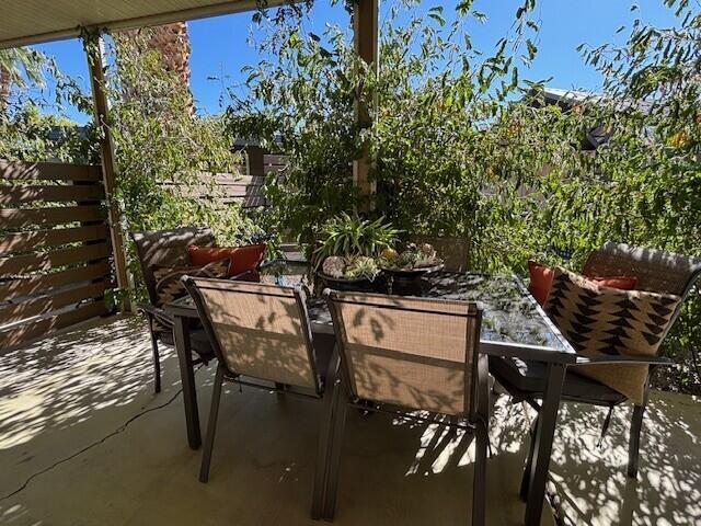 49305 Highway 74, Unit 109 Palm Desert, CA 92260 - Photo 36 of 52 a view of a chairs and table in the patio