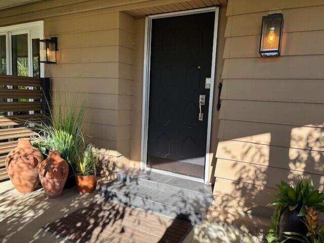 49305 Highway 74, Unit 109 Palm Desert, CA 92260 - Photo 39 of 52 a view of potted plant in front of door