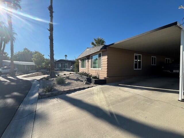49305 Highway 74, Unit 109 Palm Desert, CA 92260 - Photo 4 of 52 a view of a house with backyard