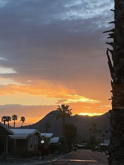 49305 Highway 74, Unit 109 Palm Desert, CA 92260 - Photo 47 of 52 a view of a city with sunset view