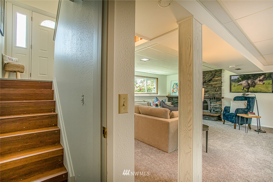 12740 Southeast 190th Place Renton, WA 98058 - Photo 16 of 28 a view of a livingroom with furniture and windows