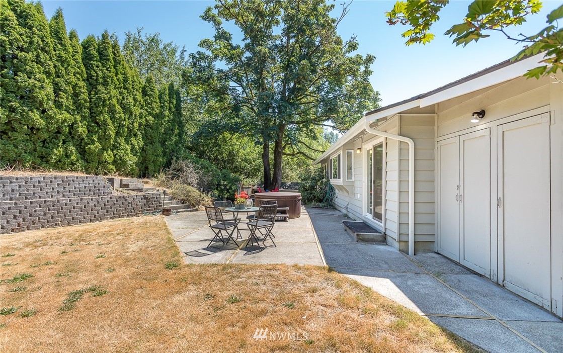 12740 Southeast 190th Place Renton, WA 98058 - Photo 21 of 28 a view of backyard with patio and outdoor seating