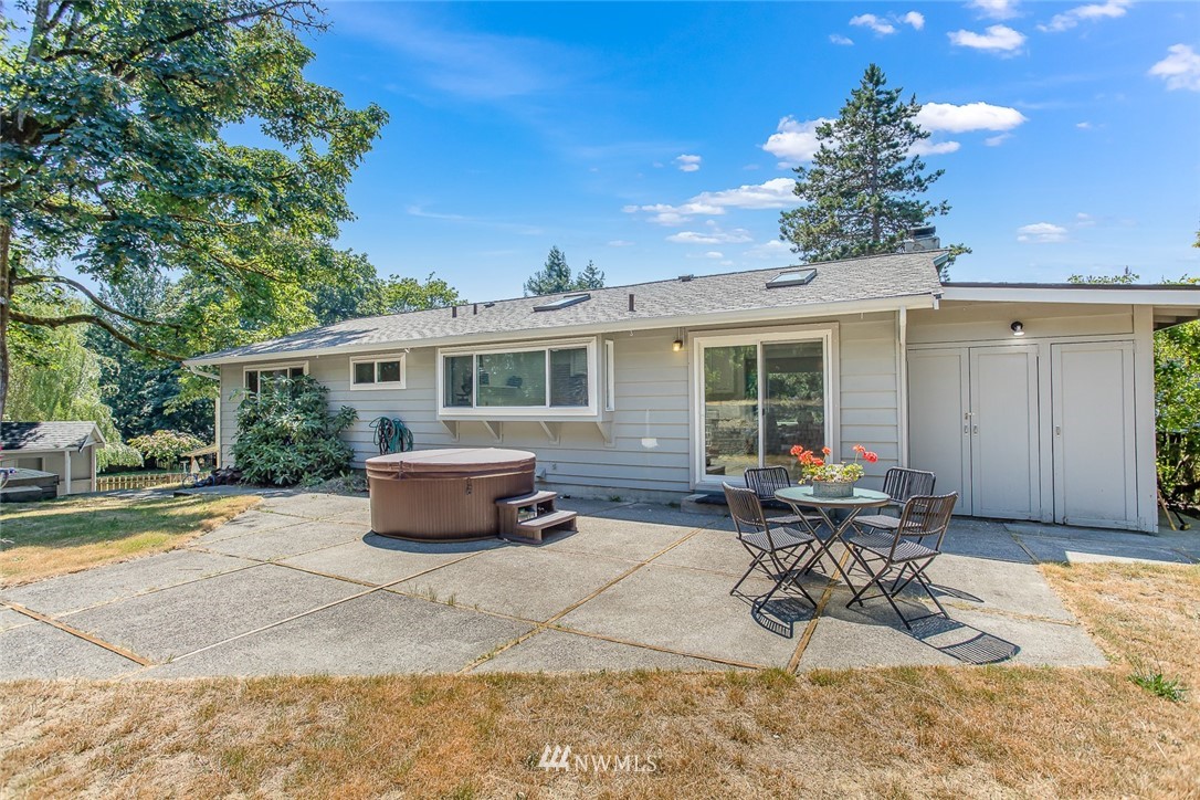 12740 Southeast 190th Place Renton, WA 98058 - Photo 25 of 28 a building outdoor space with patio furniture and potted plants