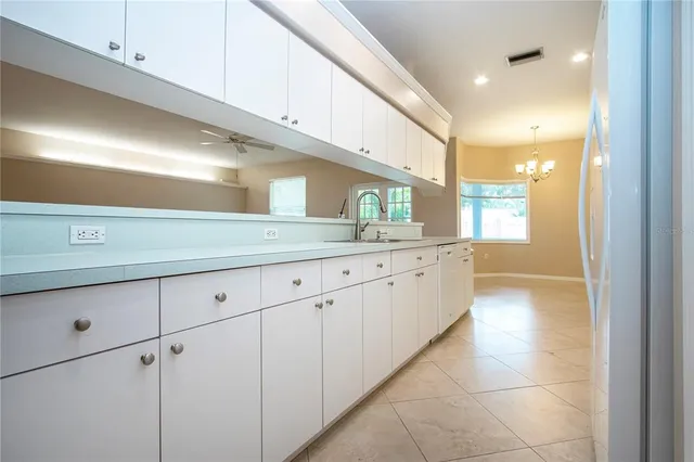 a bathroom with a sink a mirror and a bathtub