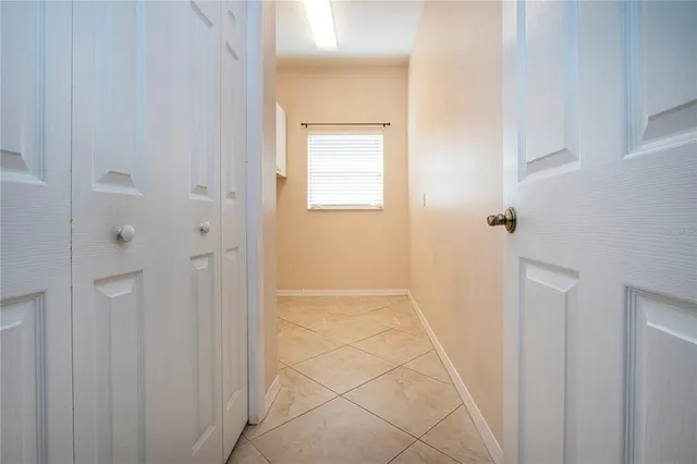 a view of cabinets and window