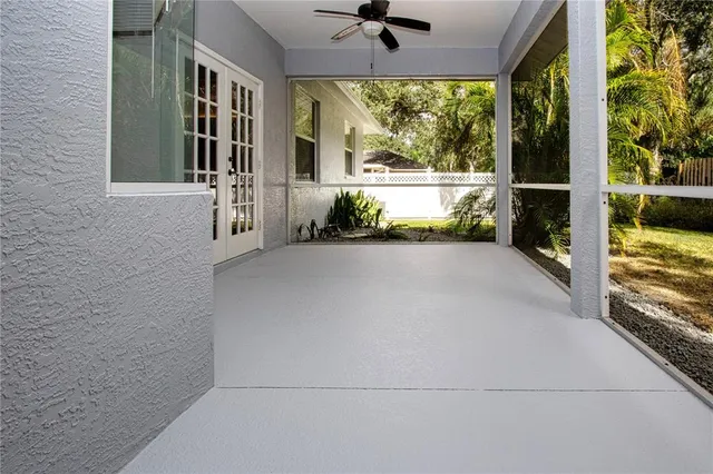 a view of a porch and garden