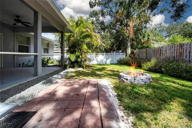 a backyard of a house with lots of green space