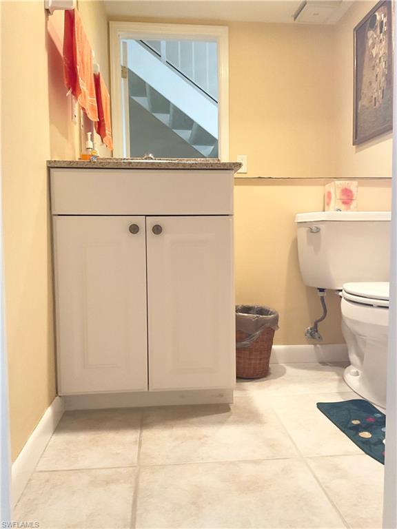 1165 Clam Court, Unit 7 Naples, FL 34102 - Photo 11 of 34 a bathroom with a toilet