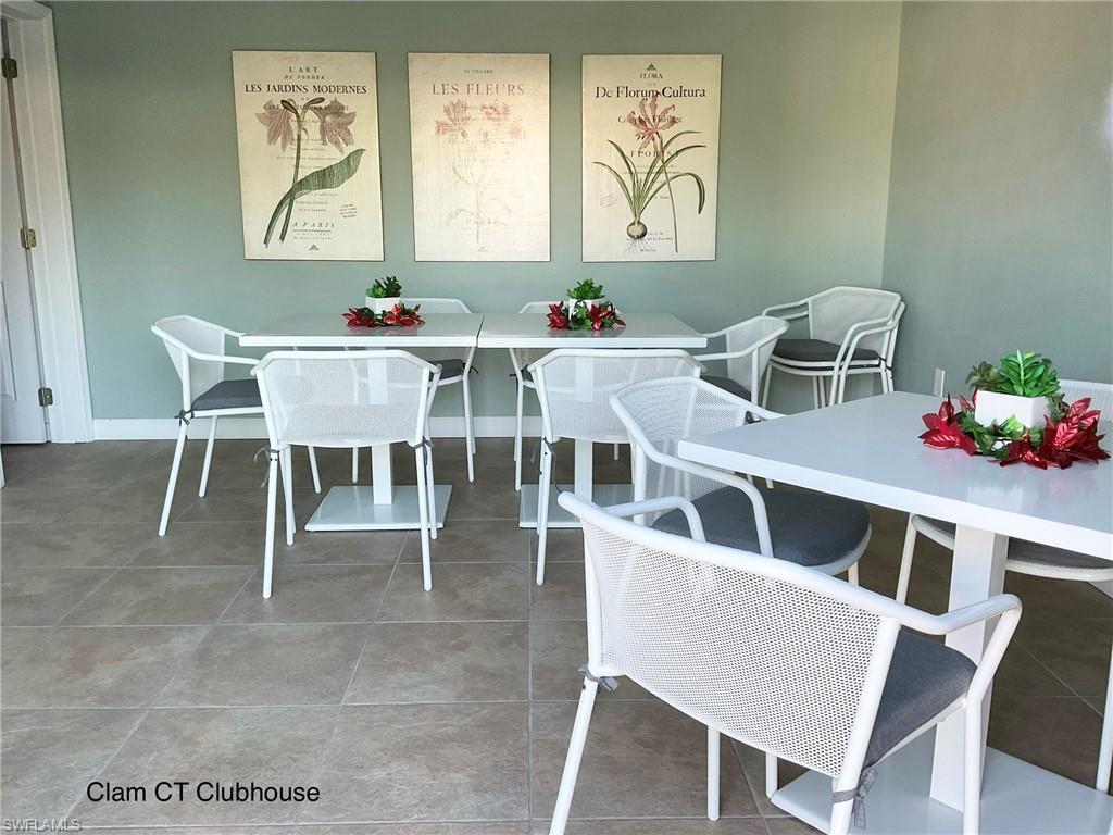 1165 Clam Court, Unit 7 Naples, FL 34102 - Photo 34 of 34 a dining room with furniture and window