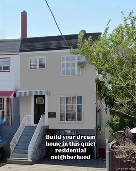 457 B 64 Street Queens, NY 11692 - Photo 4 of 4 View of front of home with a shingled roof and stucco siding