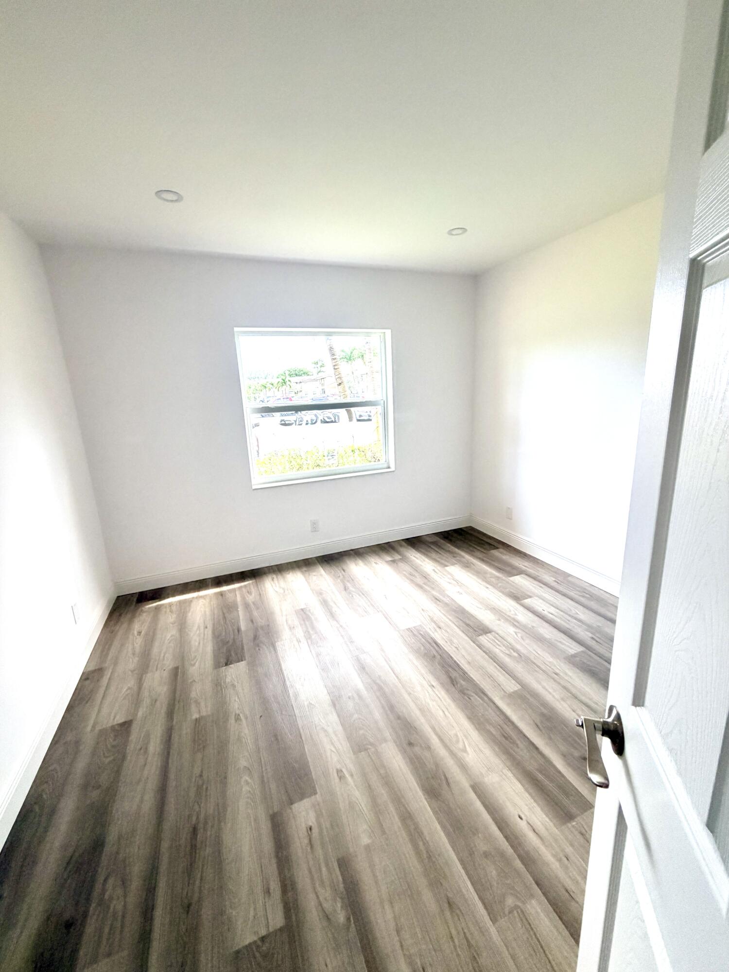 1766 Abbey Road, Unit 105 West Palm Beach, FL 33415 - Photo 5 of 8 ___F105 bedroom 1