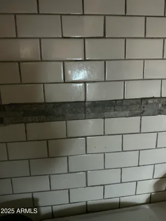 a bathroom with a close shower view