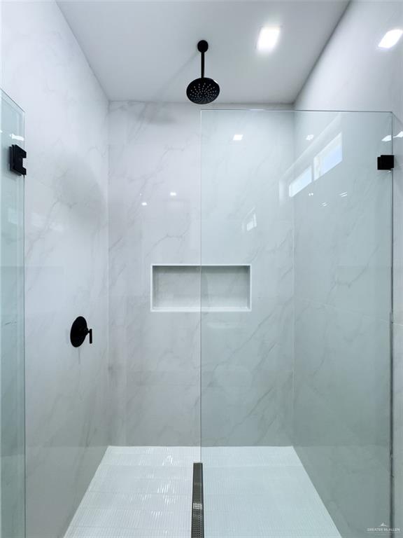 4812 Duke Avenue McAllen, TX 78504 - Photo 26 of 42 a bathroom with a shower