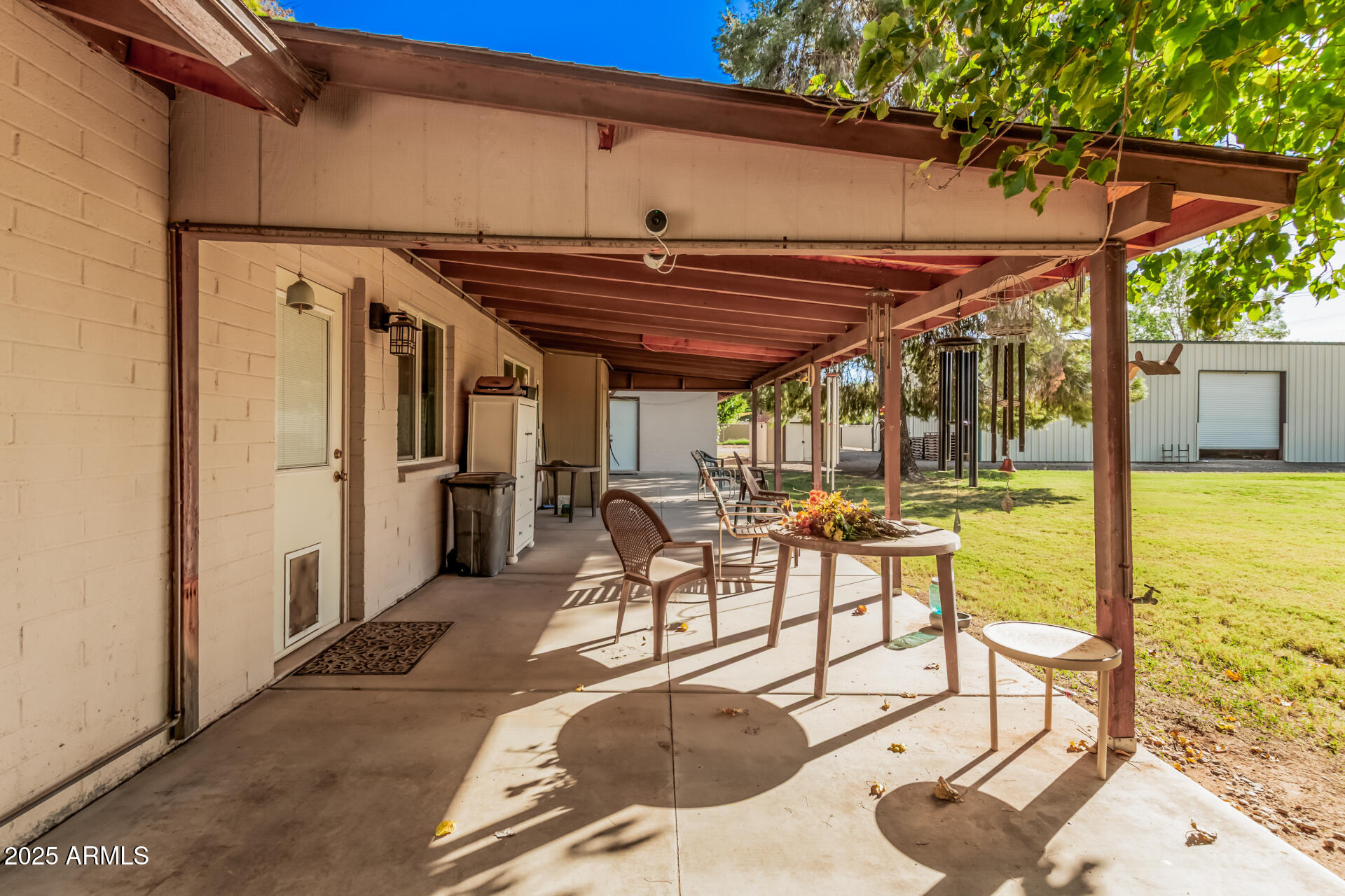 3531 East Campbell Road Gilbert, AZ 85234 - Photo 4 of 8 a view of swimming pool with outdoor seating