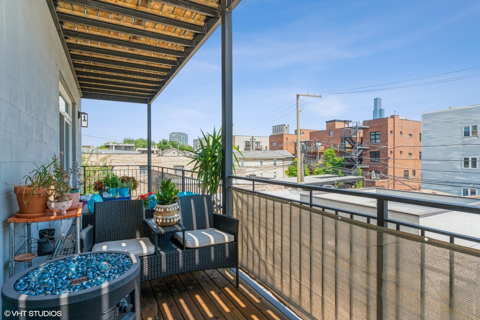 1033 South Racine Avenue, Unit 2S Chicago, IL 60607 - Photo 13 of 13 a city view from a balcony