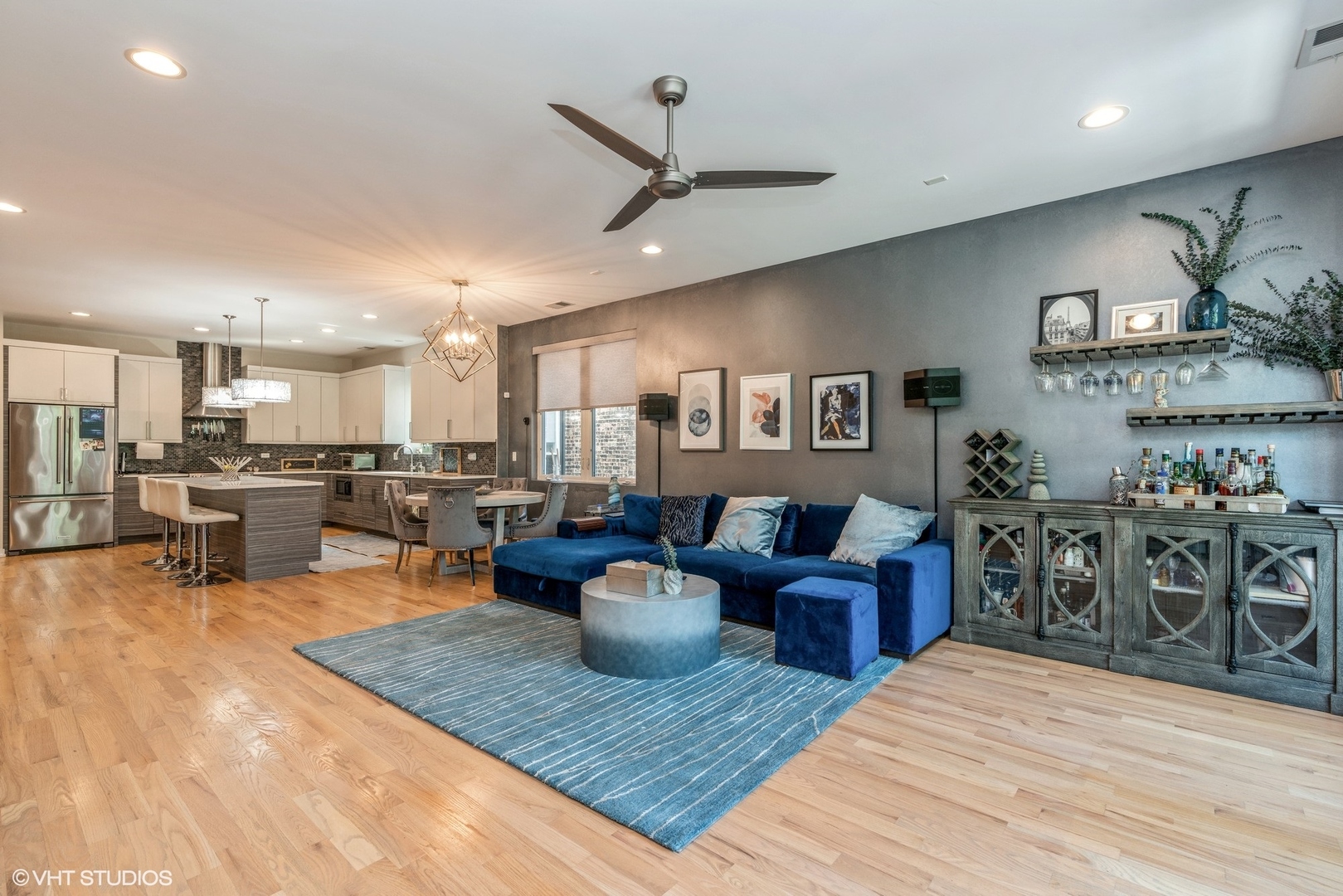 1033 South Racine Avenue, Unit 2S Chicago, IL 60607 - Photo 5 of 13 a living room with furniture kitchen view and a wooden floor