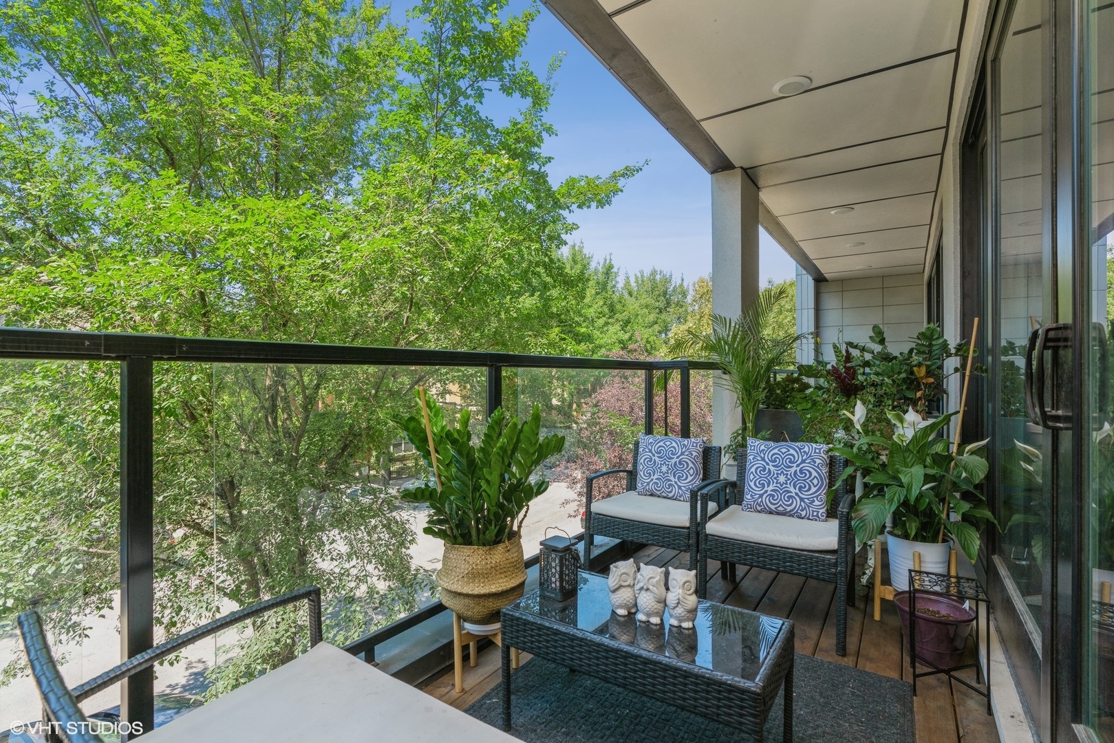 1033 South Racine Avenue, Unit 2S Chicago, IL 60607 - Photo 8 of 13 a view of a two chairs in the balcony