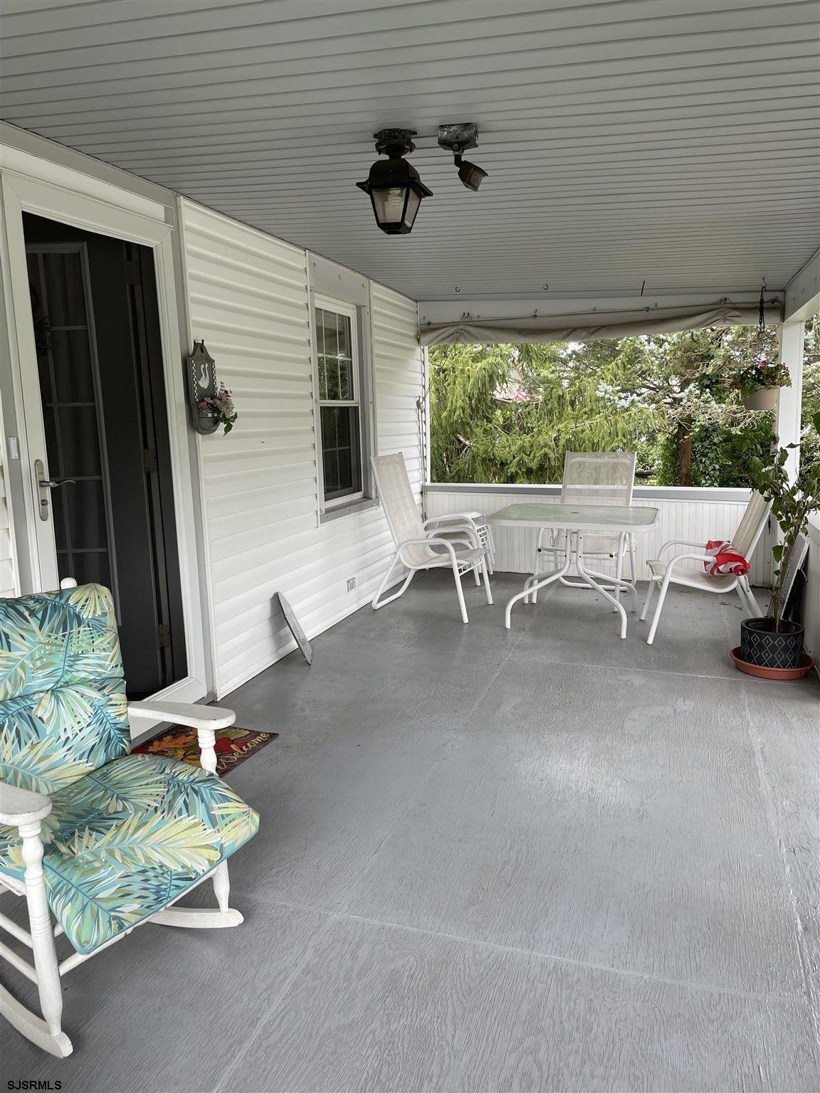 613 3rd Street Somers Point, NJ 08244 - Photo 2 of 22 a outdoor space with furniture
