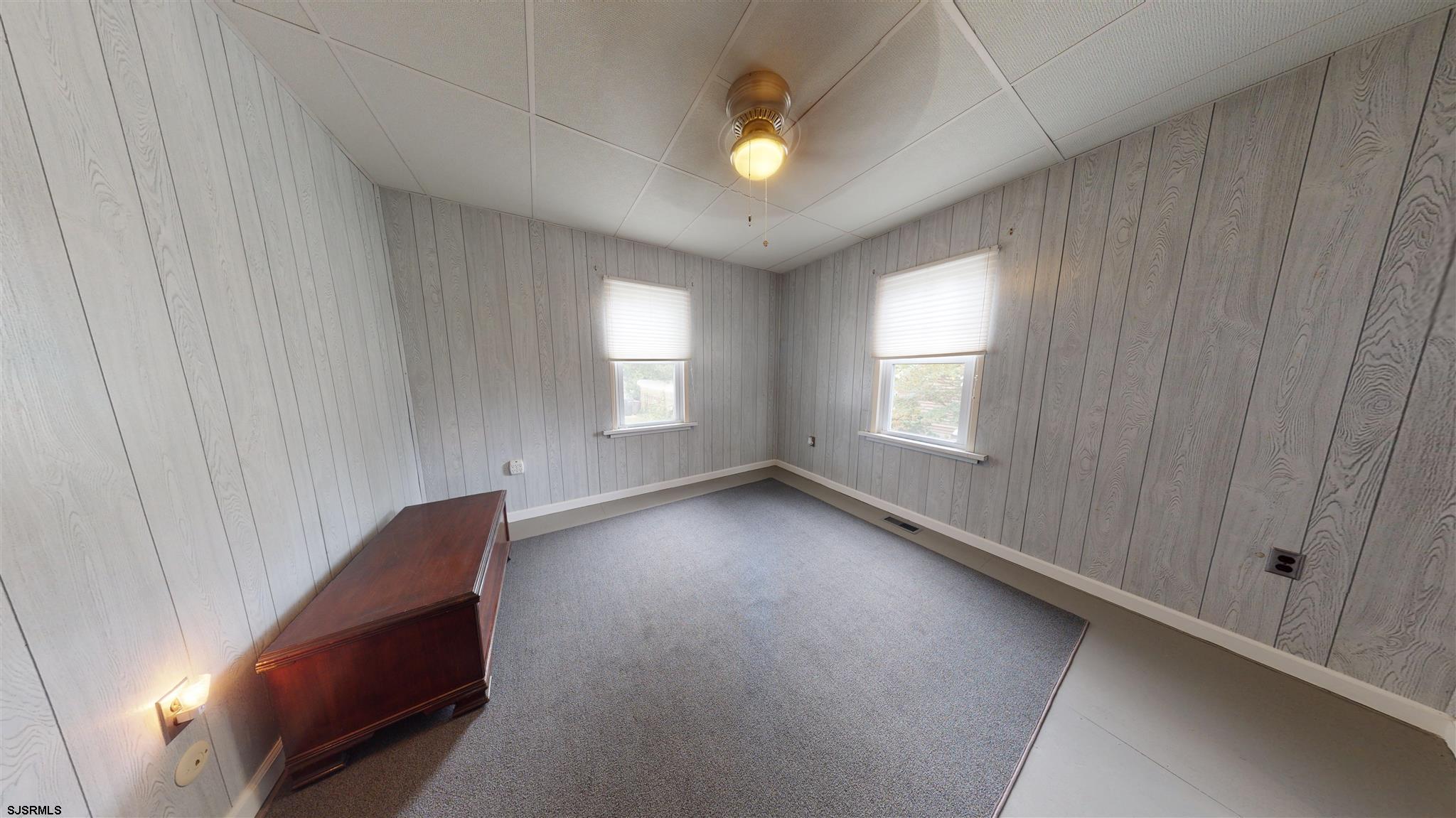 613 3rd Street Somers Point, NJ 08244 - Photo 13 of 22 a view of an empty room and window