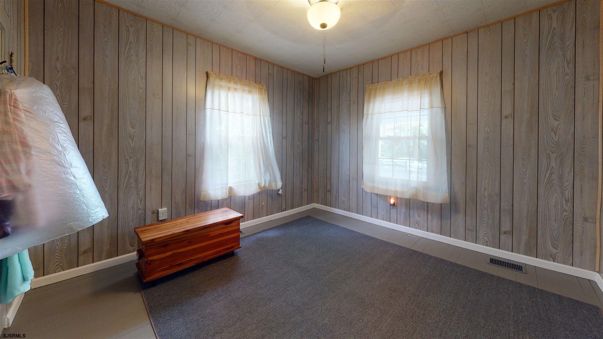 613 3rd Street Somers Point, NJ 08244 - Photo 17 of 22 a view of room with window and furniture