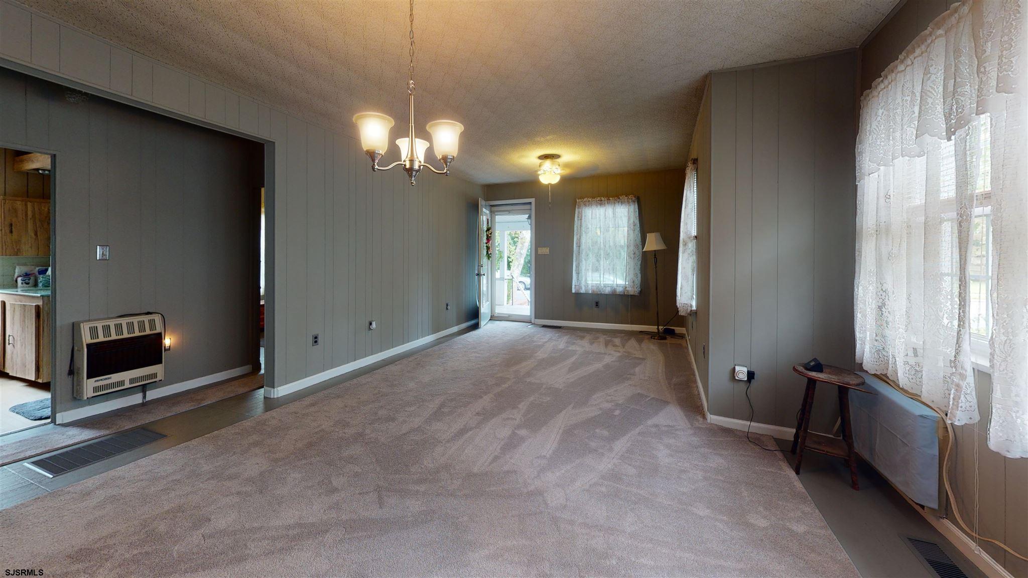 613 3rd Street Somers Point, NJ 08244 - Photo 6 of 22 a view of a livingroom with a fireplace