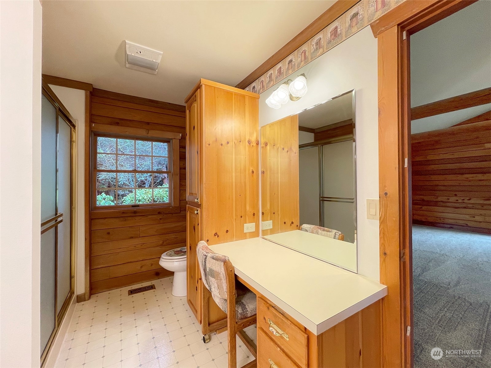 2414 Kitchen-Dick Road Sequim, WA 98382 - Photo 21 of 40 a en suite bathroom with a granite countertop sink and a mirror