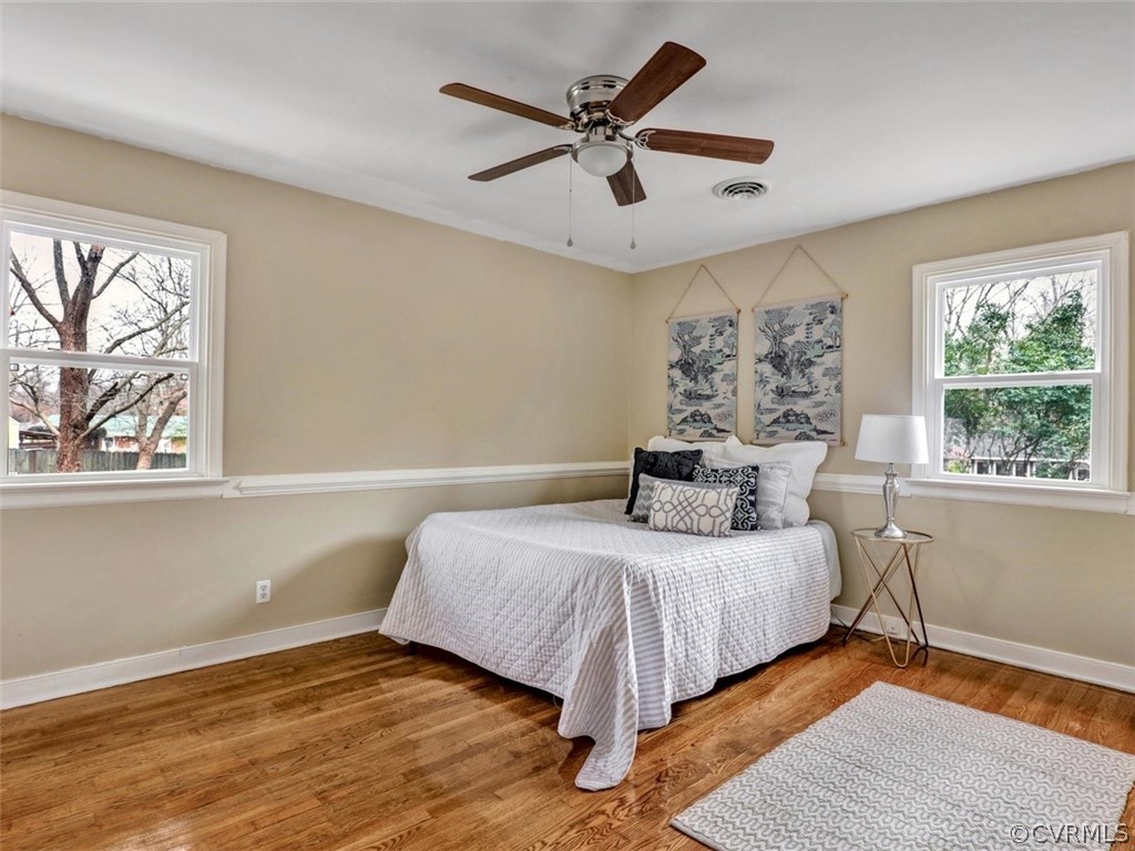 12915 Harrowgate Road Chester, VA 23831 - Photo 23 of 33 a bedroom with a bed and window