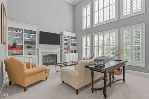 a kitchen with a sink appliances and cabinets