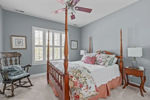 a view of deck with a table and chairs