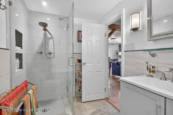 444 West Saugerties Road Saugerties, NY 12477 - Photo 14 of 20 a bathroom with a sink vanity and shower