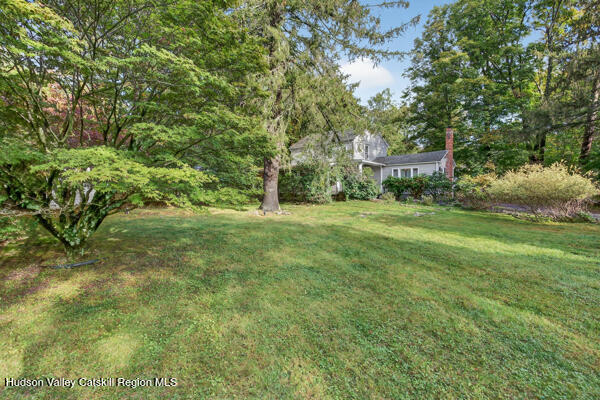 444 West Saugerties Road Saugerties, NY 12477 - Photo 3 of 20 a grassy field with trees in the background