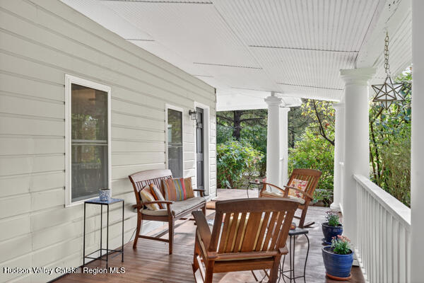 444 West Saugerties Road Saugerties, NY 12477 - Photo 6 of 20 a view of a porch with furniture and garden
