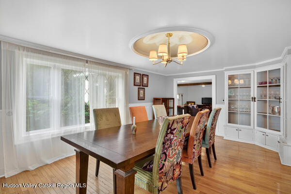 444 West Saugerties Road Saugerties, NY 12477 - Photo 10 of 20 a view of a dining room with furniture window and wooden floor