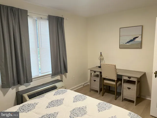 a room with a table and chairs