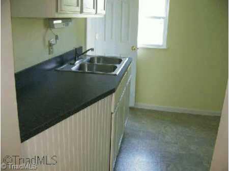 958 Buck Fork Road Dobson, NC 27017 - Photo 4 of 8 Other. Kitchen has new counter tops and vinyl flooring