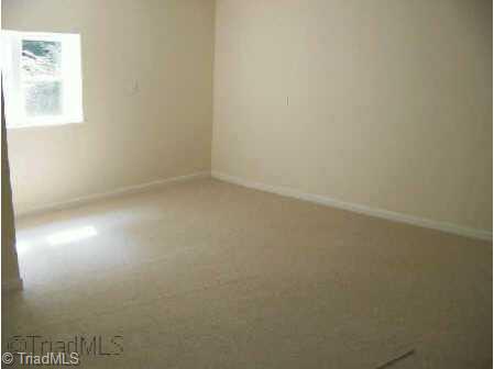 958 Buck Fork Road Dobson, NC 27017 - Photo 5 of 8 Other. Large living room - new carpet all through home