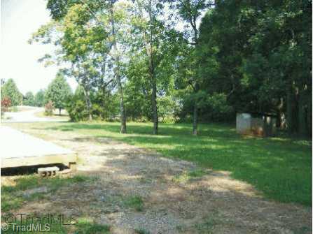 958 Buck Fork Road Dobson, NC 27017 - Photo 8 of 8 Other. Large back yard with lots of shade trees