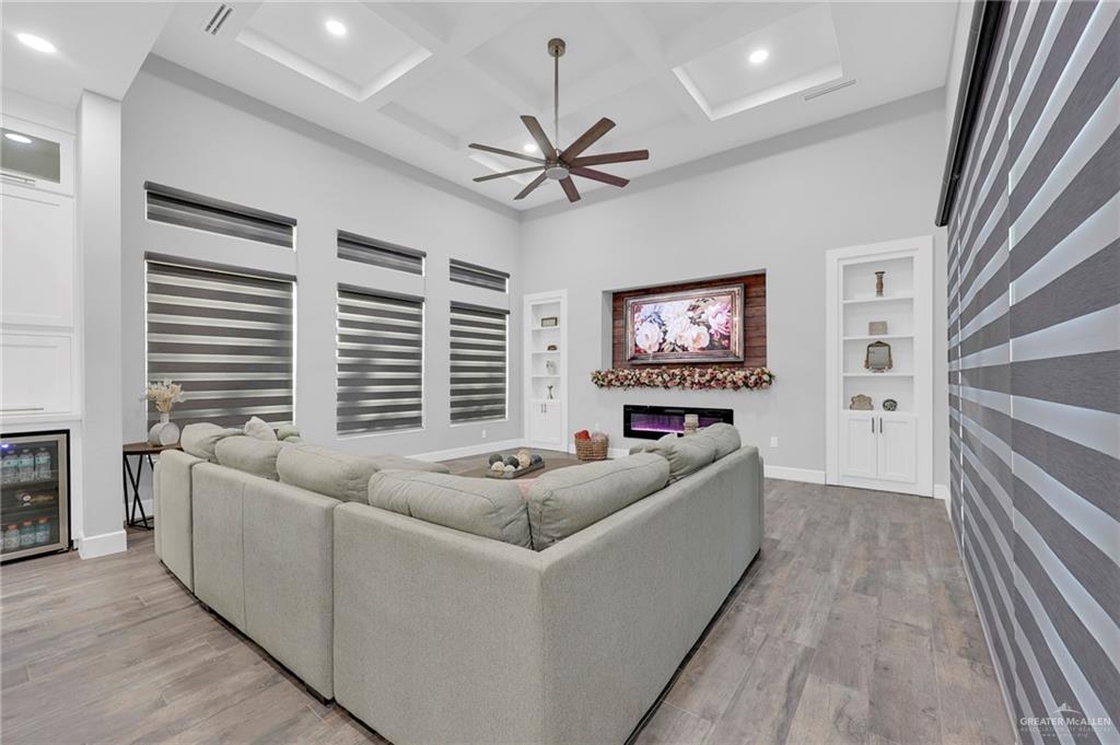 5284 North Mayberry Road Palmhurst, TX 78573 - Photo 6 of 26 a living room with furniture and a large window