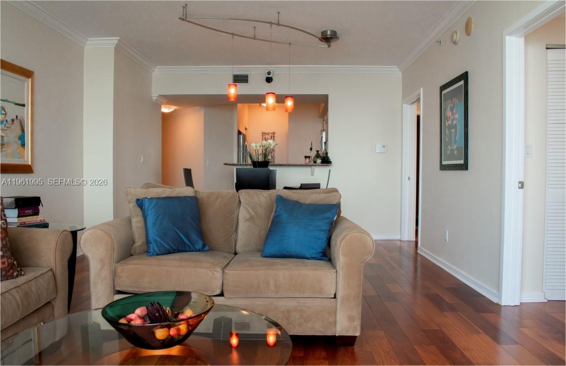 335 South Biscayne Boulevard, Unit 2212 Miami, FL 33131 - Photo 16 of 69 a living room with furniture and a window