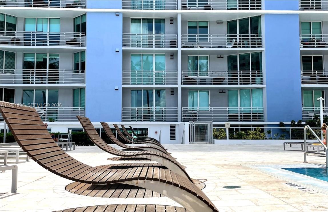 335 South Biscayne Boulevard, Unit 2212 Miami, FL 33131 - Photo 48 of 69 a view of a building with a outdoor sitting space